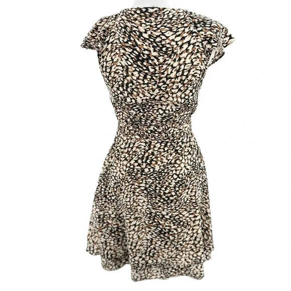Free People Wrap French Quarter Mini Dress Size Small animal
Print - Picture 5 of 9